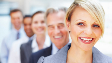 job candidates in business clothes lined up and smiling