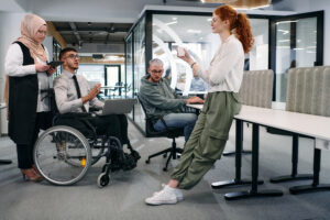 Group of coworkers brainstorming together around a table