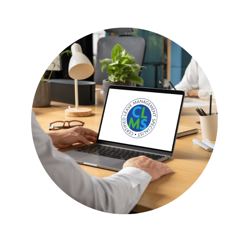 Man using a laptop to explore the Certified Leave Management Specialist (CLMS) online course platform.