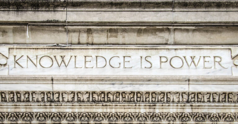 Knowledge is power carved into granite.