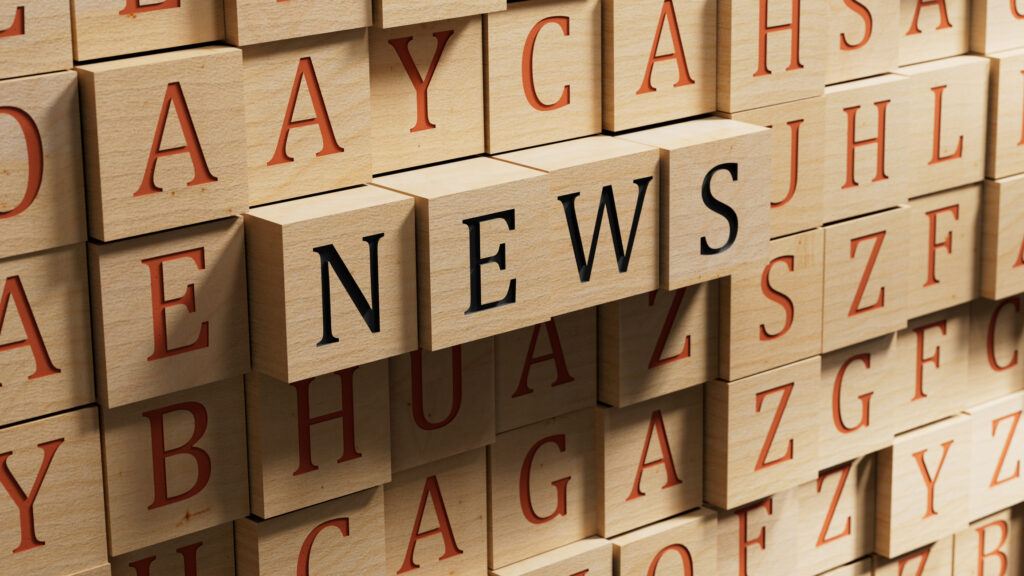 word concept - News. Minimalist Abstract Design With close up of wooden blocks,Business Concept. 3D rendering on wooden background.